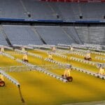 Wymagania UEFA dla stadionów kategorii 4: jakie kryteria decydują o finale Ligi Mistrzów? Nowoczesny stadion piłkarski z konstrukcj